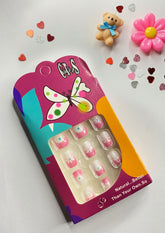 Children False Nails With a Pink and White Floral Design.