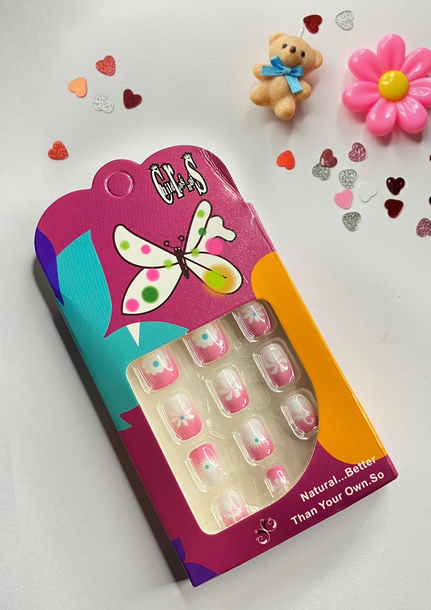 Children False Nails With a Pink and White Floral Design.